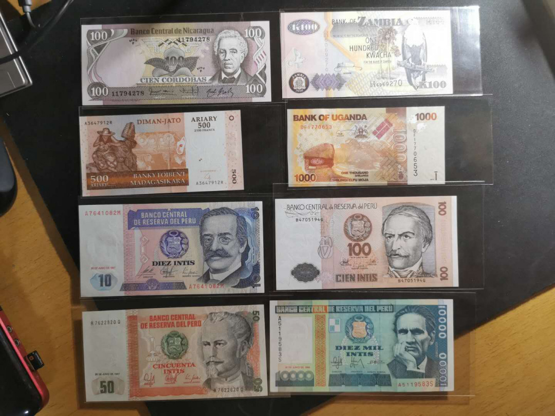 【鲸贝乐淘】千字文·第“性静情逸，心动神疲”号拍卖 【美非8张】秘鲁，安哥拉，尼加拉瓜，马达加斯加，赞比亚，全新全品UNC 