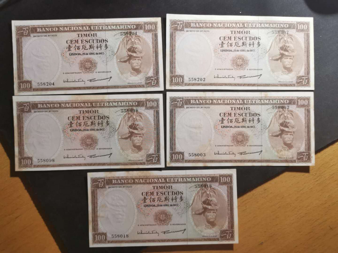 【鲸贝乐淘】千字文·第“性静情逸，心动神疲”号拍卖 【东帝汶】1963年100埃斯库多，五张一起，黄斑较多，无折痕，全新AUNC 