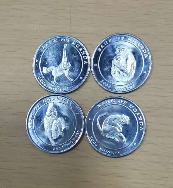 北京马甸外币专卖微拍第二十四期，非贵金属纪念币，流通币专场，陆续上新，欢迎关注  乌干达猴子纪念币4枚，品相如图