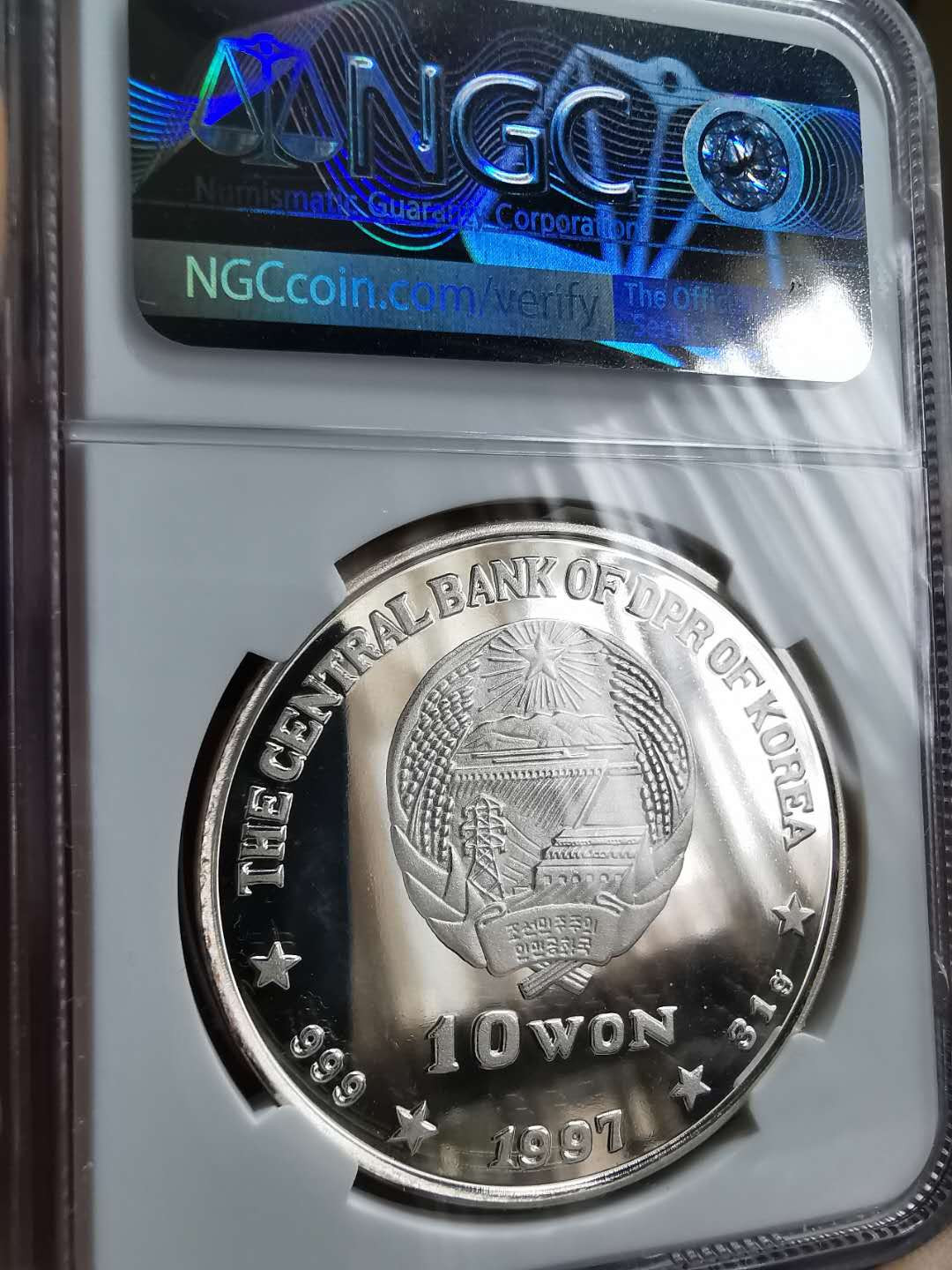 凡希社世界钱币微拍第一百三十三期 1997朝鲜庆祝香港回归中国纪念大银NGC-PF66UC