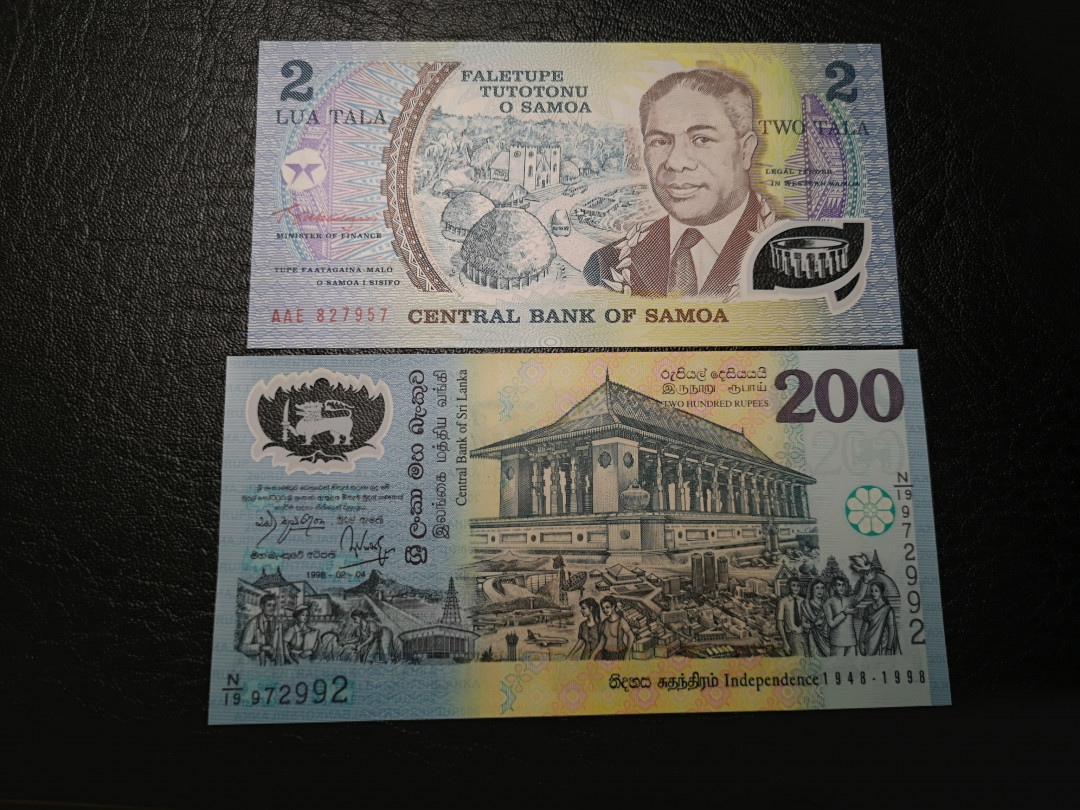 《外钞收藏家》第八十四期拍卖（广州2020币展特拍） 两张塑料钞小票 全新unc