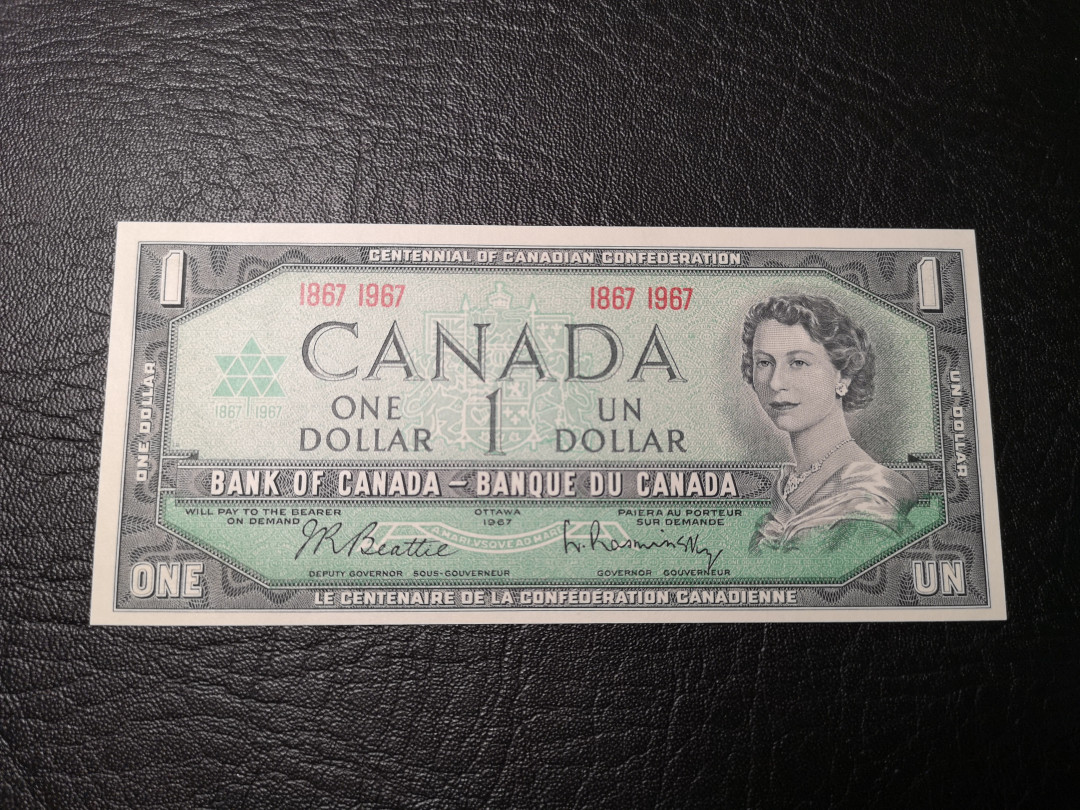 《外钞收藏家》第八十五期拍卖 1967年加拿大1加元 全新品相  背面建筑雕刻精细 漂亮 纪念钞