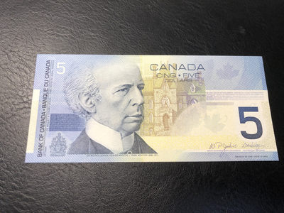 《外钞收藏家》第八十五期拍卖 - 加拿大旅版5加元  初版 全新绝品
