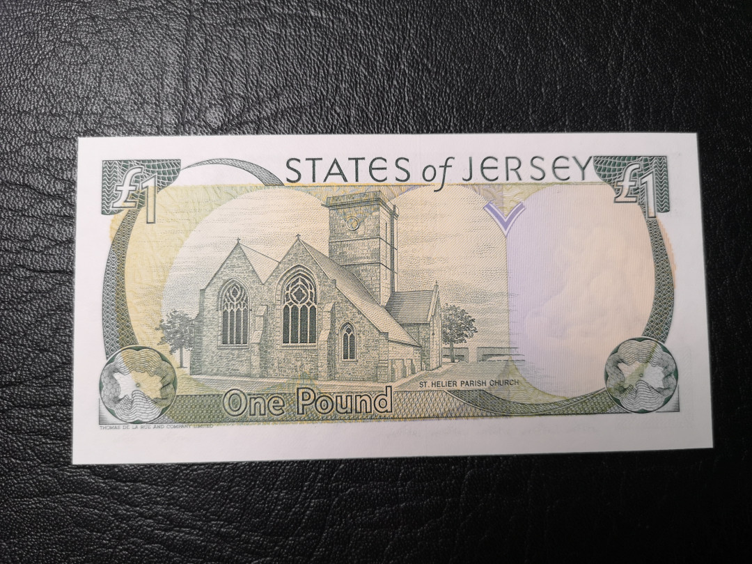 《外钞收藏家》第八十五期拍卖 泽西1镑 795百位号 全新绝品