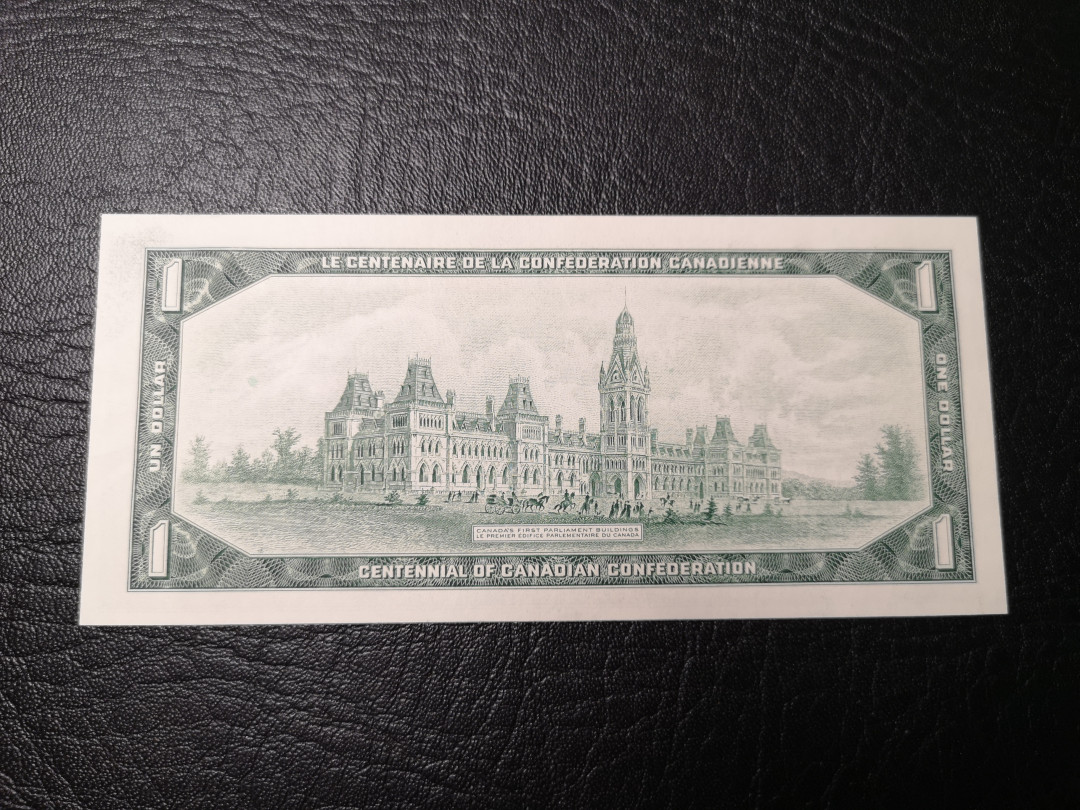 《外钞收藏家》第八十五期拍卖 1967年加拿大1加元 全新品相  背面建筑雕刻精细 漂亮 纪念钞