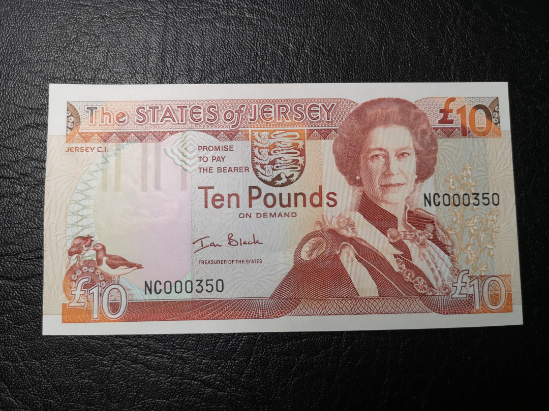 《外钞收藏家》第八十五期拍卖 泽西10镑 350百位号 背面很漂亮 全新绝品