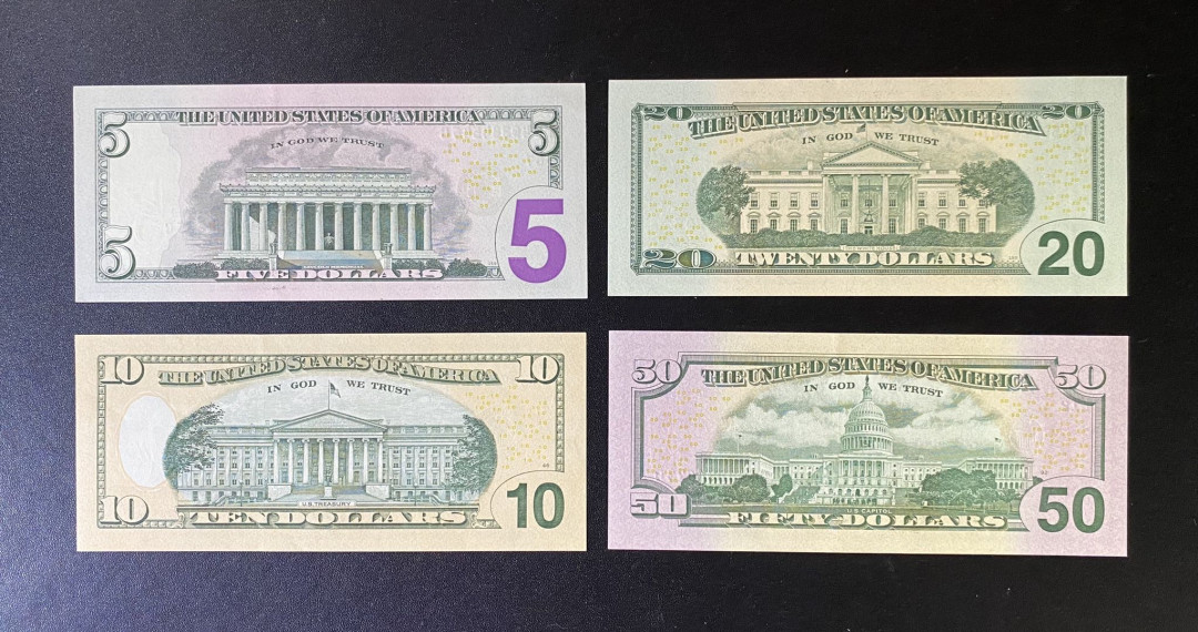 兄弟钱币收藏2020年第54期拍卖 美国2013年彩版小套5-10-20-50元，UNC，10美元有压痕