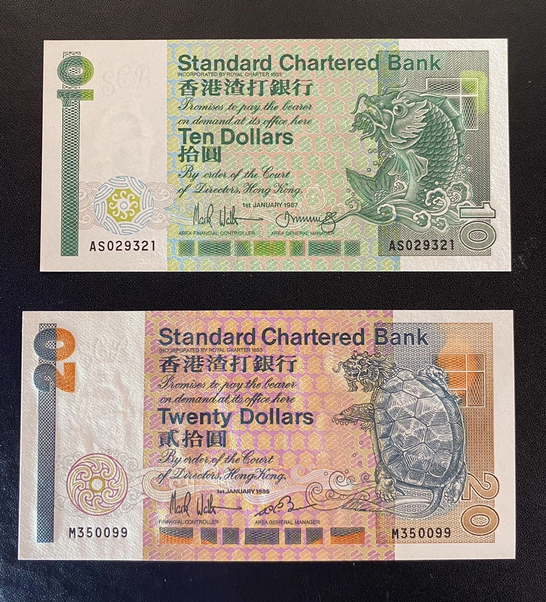 兄弟钱币收藏2020年第54期拍卖 香港渣打银行87年长棍小鲤鱼10元和85年首发年长棍20元，UNC（10元有轻微潮斑）