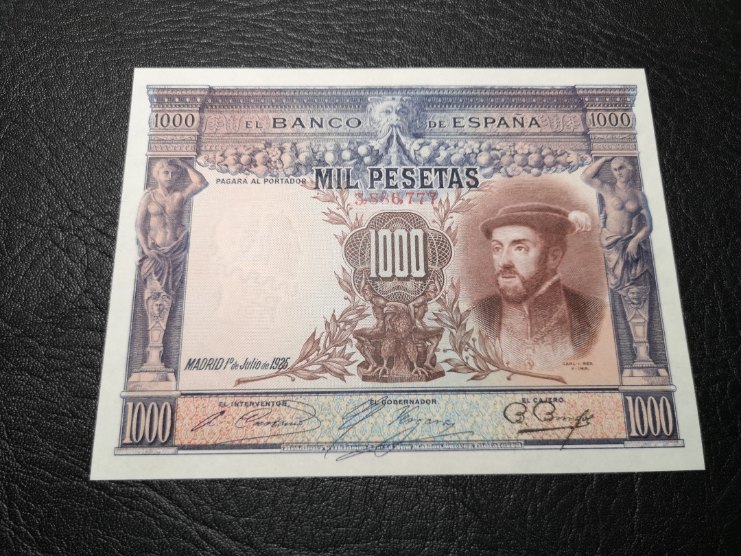《外钞收藏家》第八十六期拍卖 国庆节专场 西班牙1925年1000比塞塔 超大票 777 豹子号 中间有折 au品相  非常精美