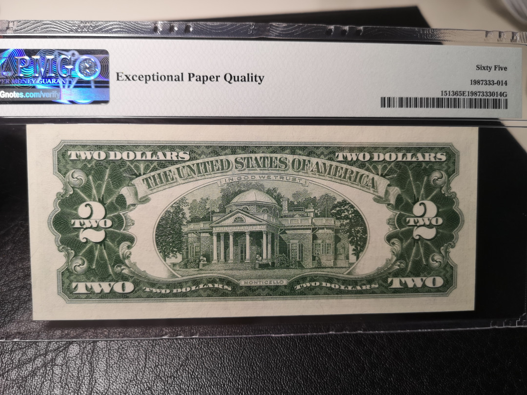 《外钞收藏家》第八十六期拍卖 国庆节专场 1963年2美元  红库印 pmg65