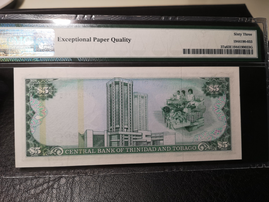 《外钞收藏家》第八十六期拍卖 国庆节专场 特里尼亚和多巴哥 1985年5刀 pmg63