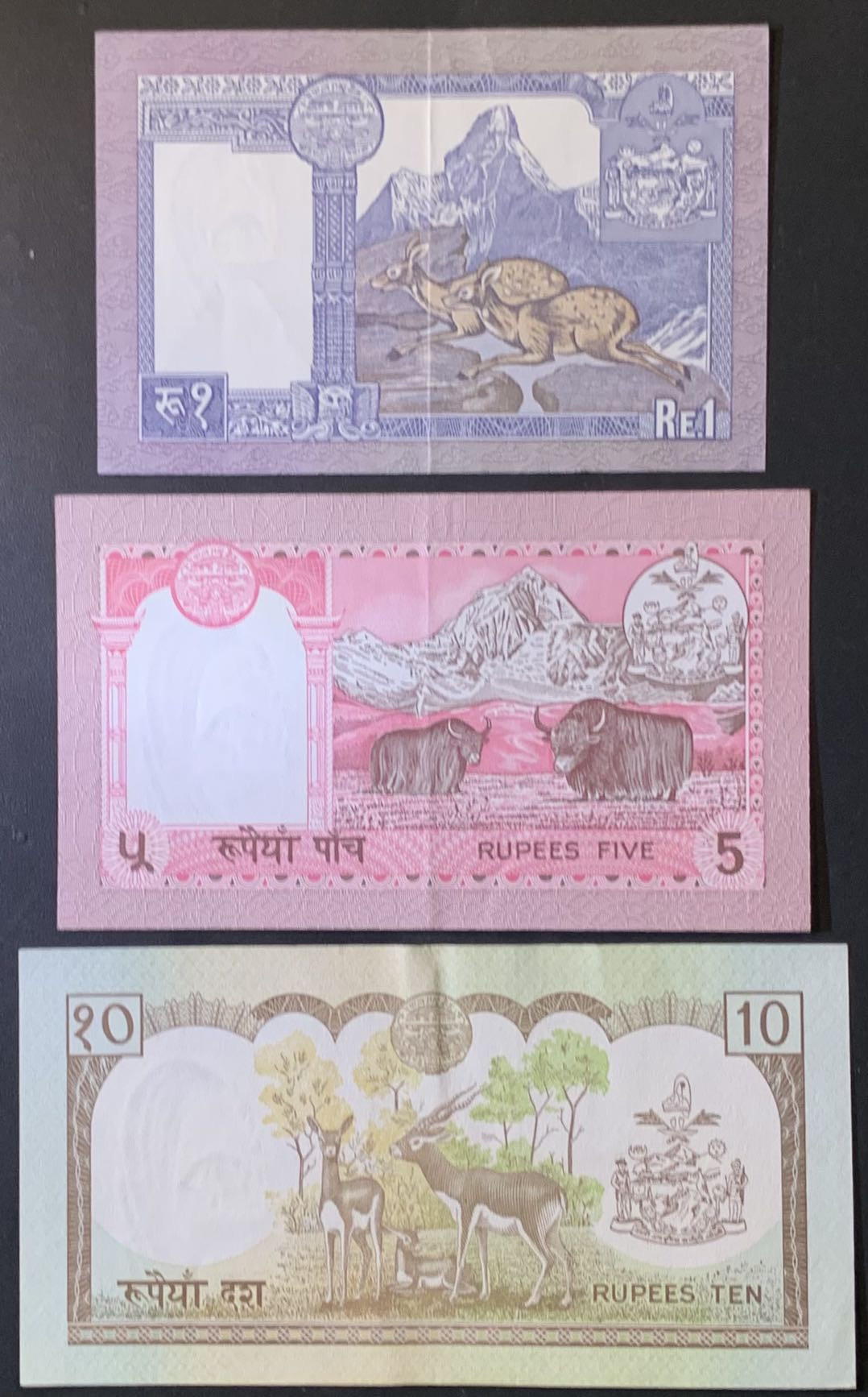 紫瑗钱币——微拍第112期—纸币场 尼泊尔  贾南德拉国王 2 5 10卢比 3枚一组 AUNC 中间有折