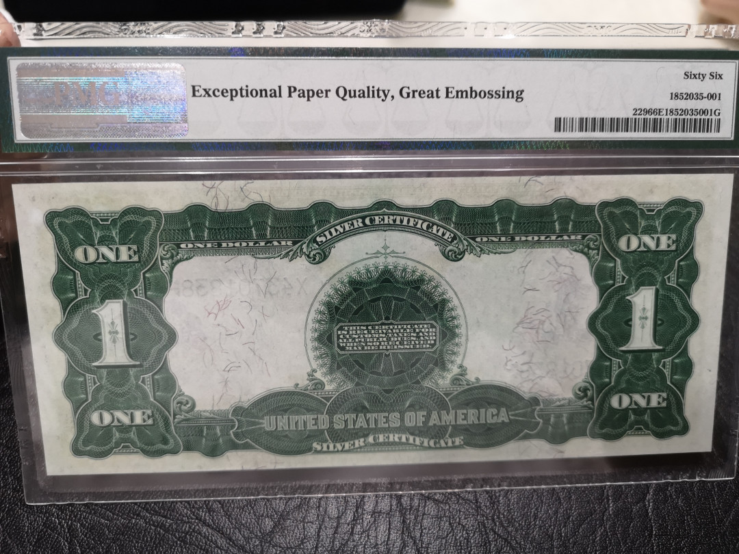 《外钞收藏家》第八十七期拍卖 1899年1美元 黑鹰 老美元收藏 必入品种 无任何瑕疵 pmg66 完美品相 背面浓墨 特殊标签