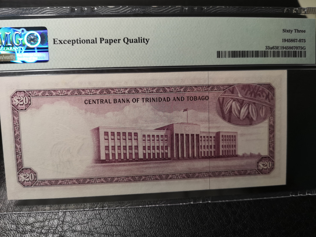 《外钞收藏家》第八十七期拍卖 特里达尼亚和多巴哥 AA冠 BWC版 20刀 pmg63