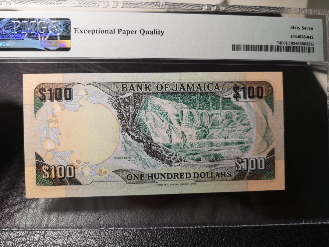 《外钞收藏家》第八十七期拍卖 牙买加1986-87年 100刀  pmg67