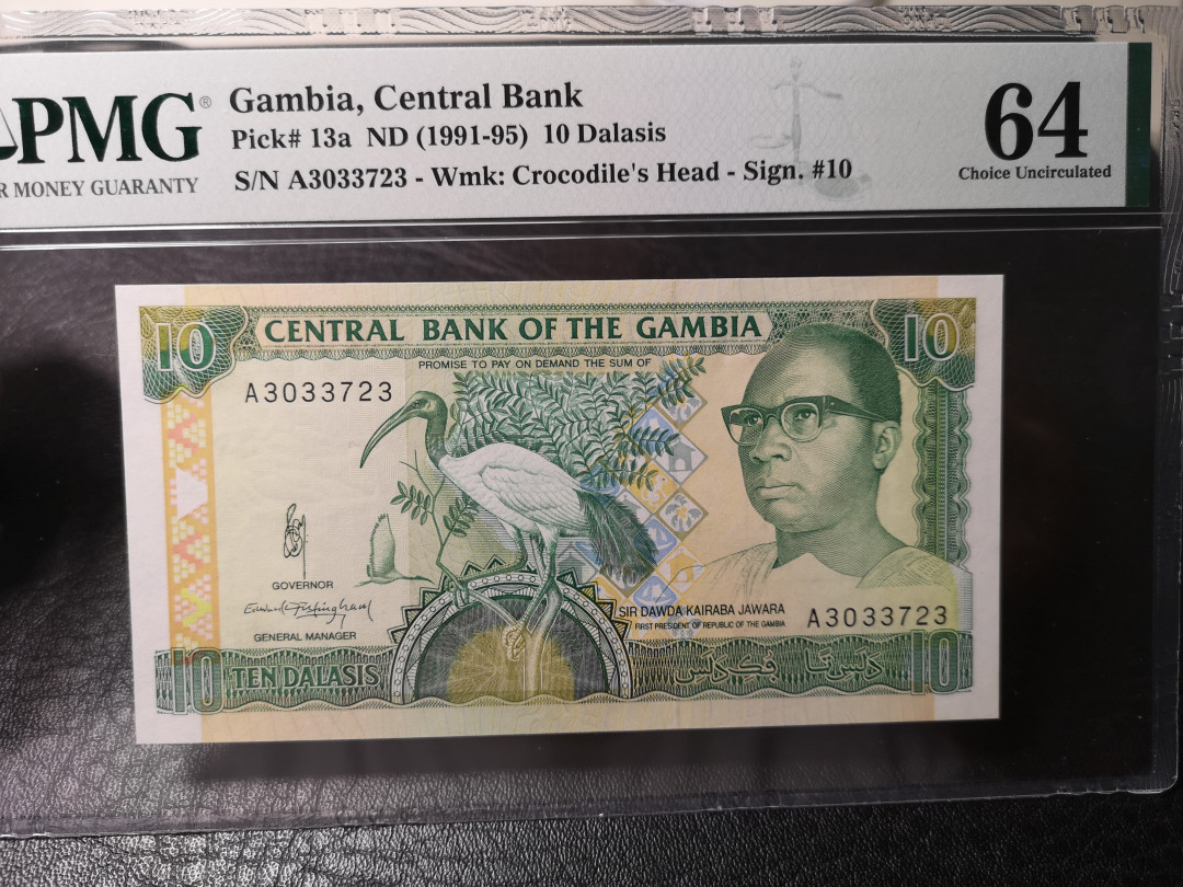《外钞收藏家》第八十七期拍卖 刚比亚 1991-95年 10面额 pmg64