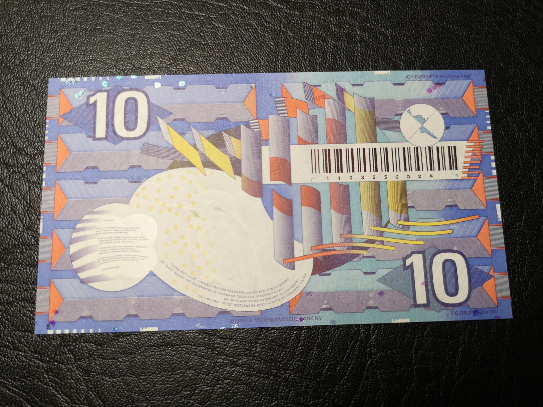 《外钞收藏家》第八十八期拍卖 荷兰 齿轮版 10盾 全新绝品 