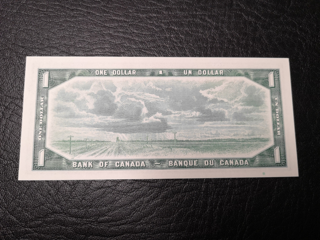 《外钞收藏家》第八十八期拍卖 1954年加拿大风景版1元  全新