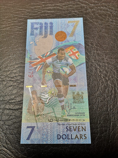 《外钞收藏家》第八十八期拍卖 - 斐济足球钞  7元 全新绝品