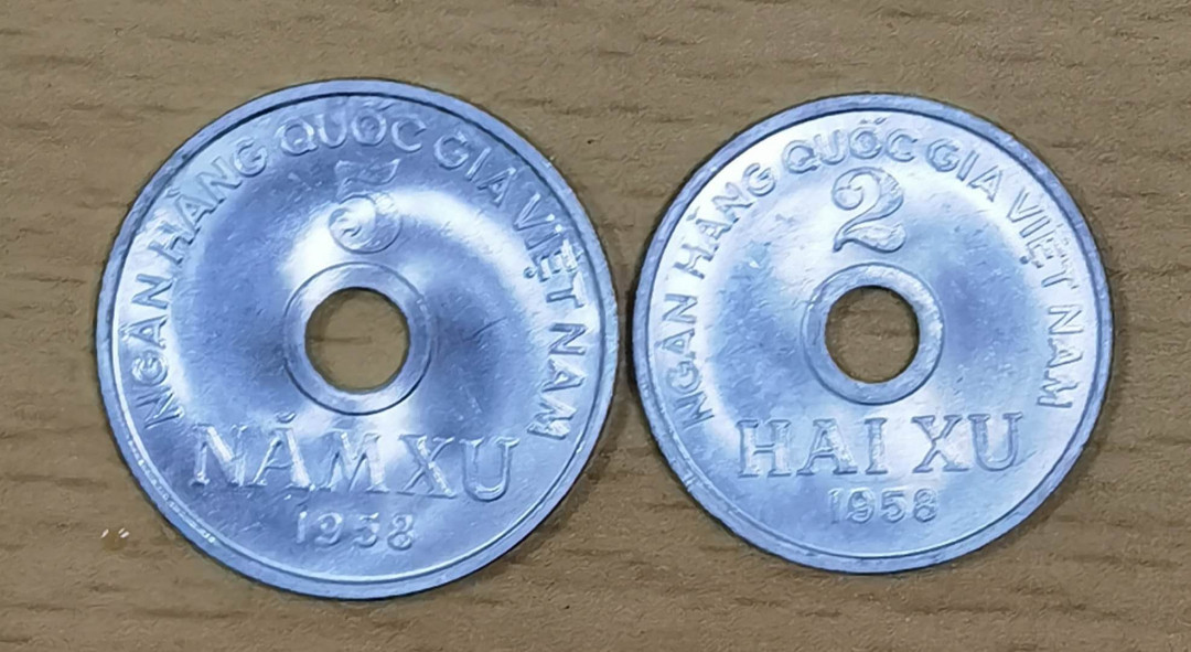 北京马甸外币专卖拍卖第二十七期，非贵金属流通币，纪念币专场，陆续上新，欢迎关注。 越南1958年原光铝币1对，品相如图