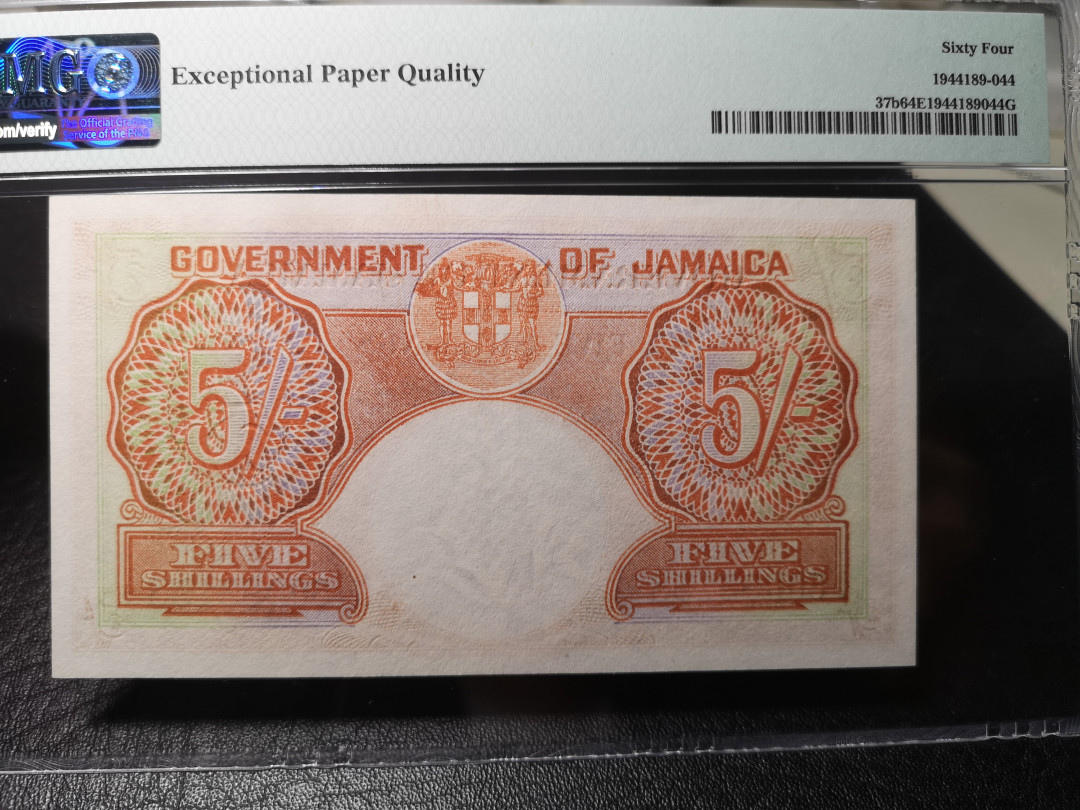 《外钞收藏家》第九十期 拍卖 牙买加1955年5先令 男皇 pmg64e