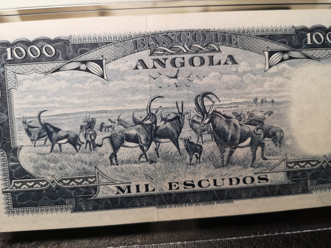 《外钞收藏家》第九十期 拍卖 安哥拉1970年1000  pmg55雕刻非常精美的一张 