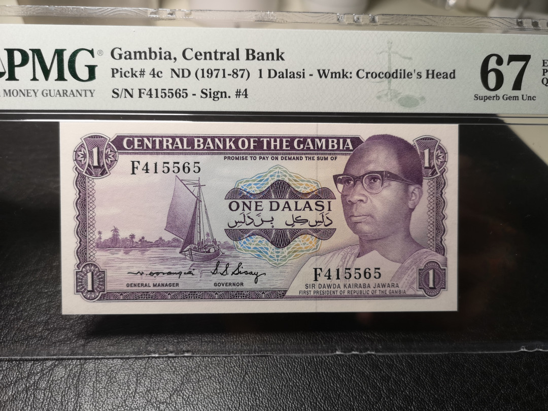 《外钞收藏家》第九十期 拍卖 冈比亚1971-87年 1 pmg67 漂亮的背面