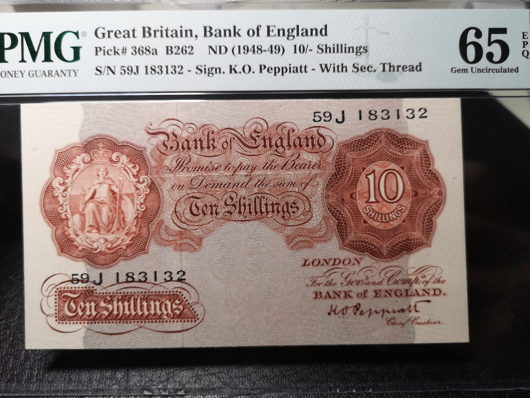 《外钞收藏家》第九十期 拍卖 英国A序列10先令 pmg65
