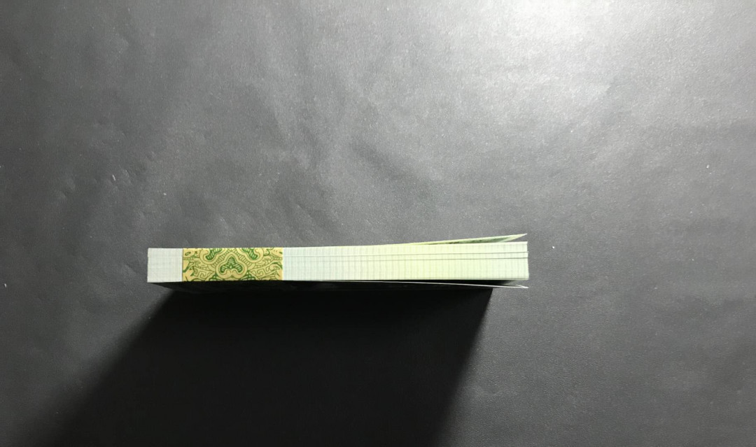 【鲸贝乐淘】千字文·第“杜稿钟隶，漆书壁经”号拍卖 40.第四版人民币80年2角捆拆百连角白尖，301一刀。