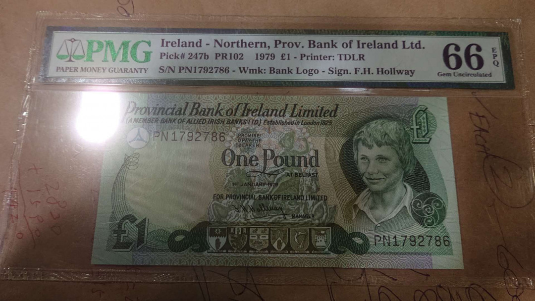 【囧羊收藏】精选微拍第4场~评级币专场（有澳门金龙，荷兰伊拉斯谟等），近期陆续上架 1979面爱尔兰1镑 全新UNC PMG66E