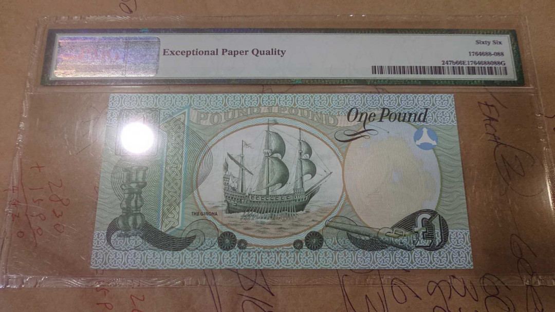 【囧羊收藏】精选微拍第4场~评级币专场（有澳门金龙，荷兰伊拉斯谟等），近期陆续上架 1979面爱尔兰1镑 全新UNC PMG66E