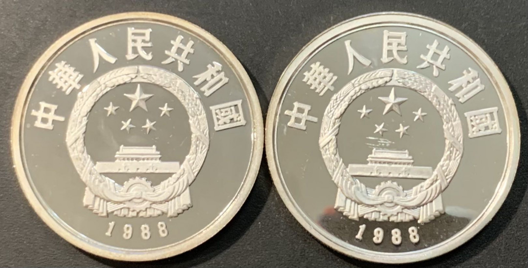 紫瑗钱币—微拍第119期  中国 1988年 珍稀野生动物 第一组 朱鹮 白鱀豚 10元 银币 2枚一组 