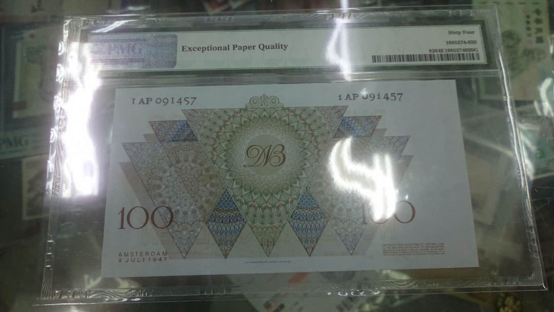 【囧羊收藏】精选微拍第4场~评级币专场（有澳门金龙，荷兰伊拉斯谟等），近期陆续上架 1947年荷兰100盾 PMG64E（居中偏离明显所致，裸币本身无任何毛病，超值。65就2000多了）