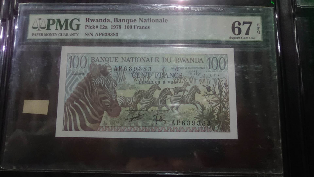 【囧羊收藏】精选微拍第4场~评级币专场（有澳门金龙，荷兰伊拉斯谟等），近期陆续上架 1978年卢旺达100法郎 斑马 PMG67E高分难评 全新绝品无47号码