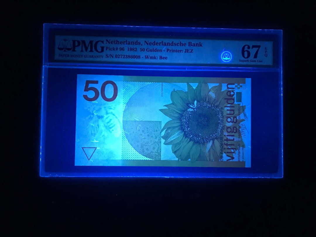 【鲸贝乐淘·综合】千字文·第“户封八县，家给千兵”号拍卖 62，美评PMG67E早期稀少二代小蓝壳荷兰三剑客之一名钞50盾向日葵一张，尾86008靓号。