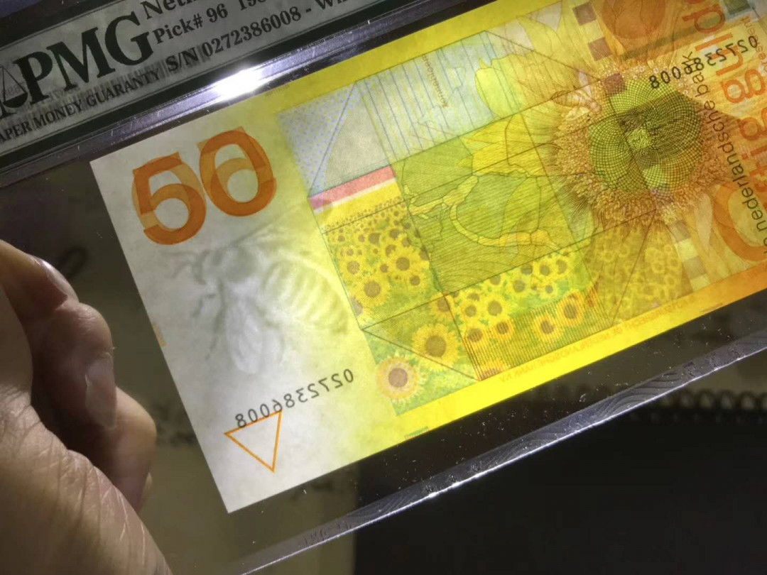 【鲸贝乐淘·综合】千字文·第“户封八县，家给千兵”号拍卖 62，美评PMG67E早期稀少二代小蓝壳荷兰三剑客之一名钞50盾向日葵一张，尾86008靓号。