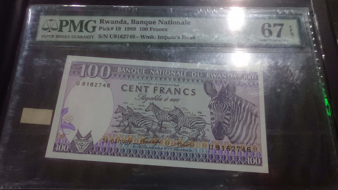 【囧羊收藏】精选微拍第4场~评级币专场（有澳门金龙，荷兰伊拉斯谟等），近期陆续上架 1989年卢旺达100法郎 PMG67E 全新绝品