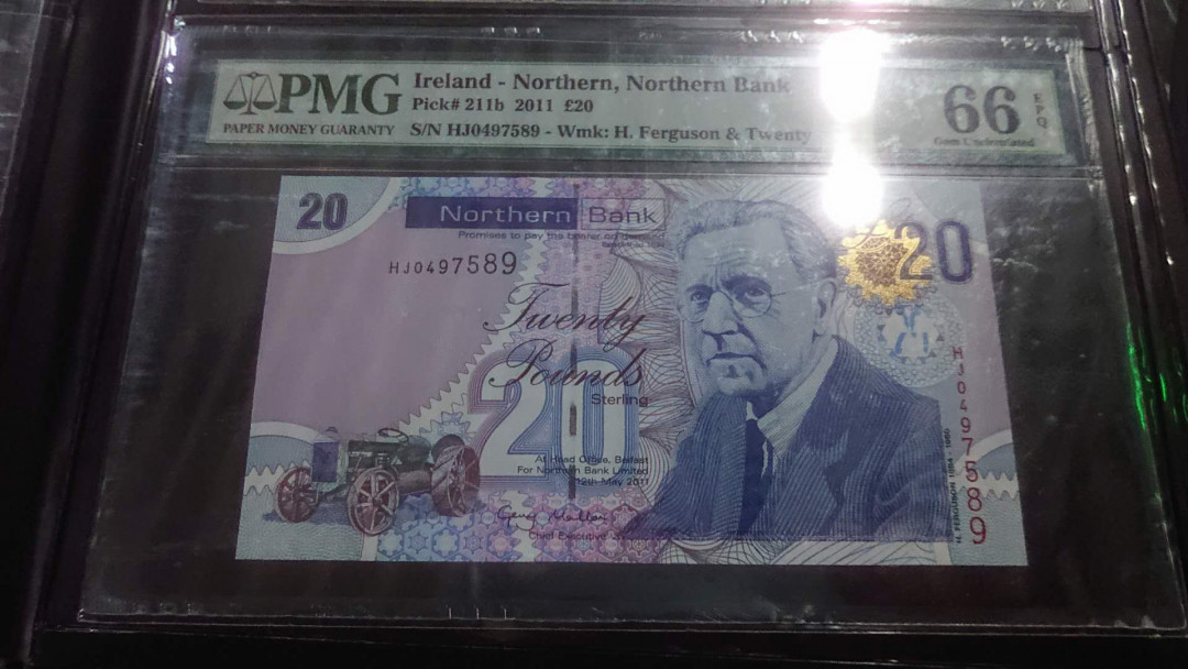 【囧羊收藏】精选微拍第4场~评级币专场（有澳门金龙，荷兰伊拉斯谟等），近期陆续上架 2011年北爱尔兰北方银行20元 PMG66E 全新UNC