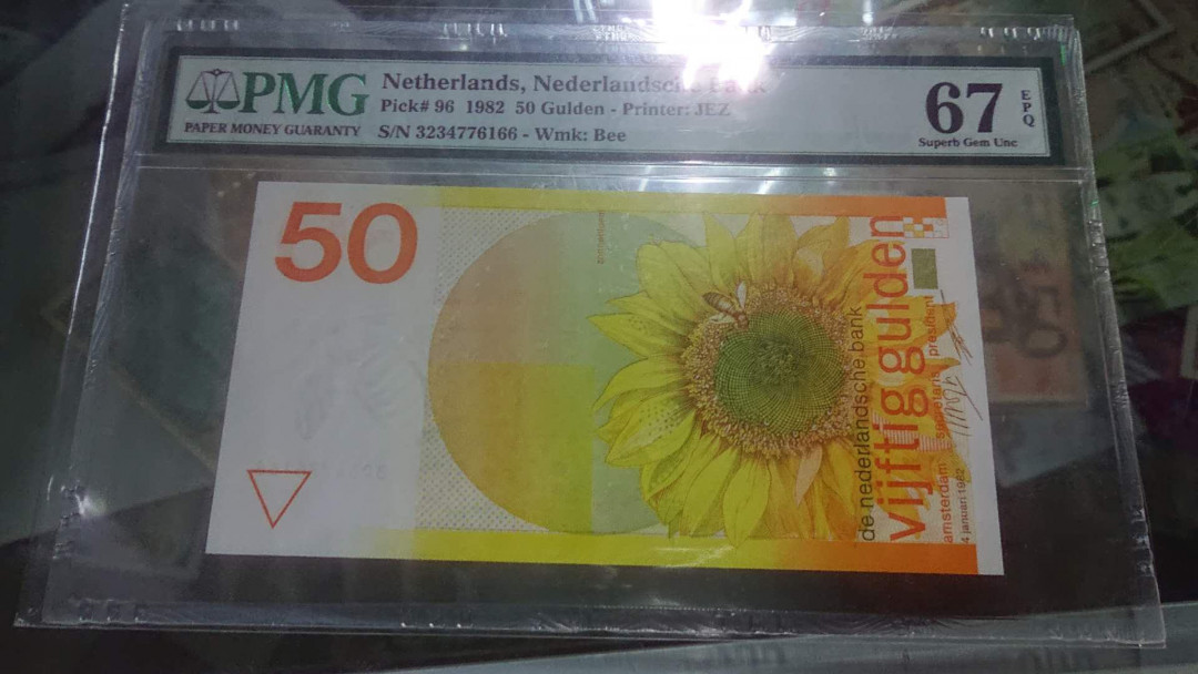 【囧羊收藏】精选微拍第4场~评级币专场（有澳门金龙，荷兰伊拉斯谟等），近期陆续上架 1982年荷兰50盾 向日葵 PMG67E 全新绝品