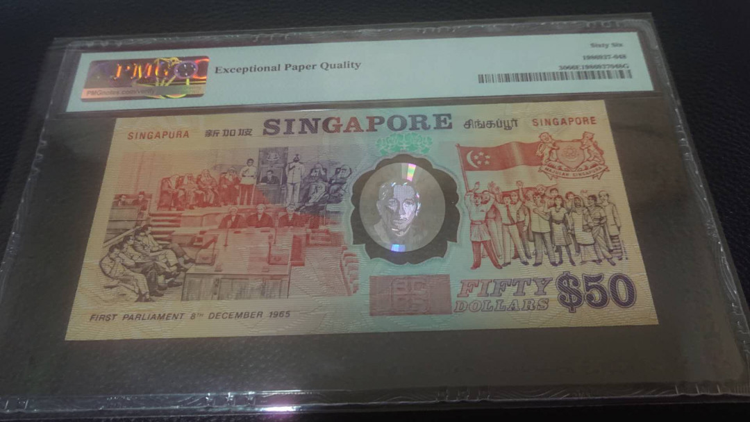 【囧羊收藏】精选微拍第4场~评级币专场（有澳门金龙，荷兰伊拉斯谟等），近期陆续上架 1990年新加坡独立25周年塑料纪念钞 A冠带年份 PMG66E