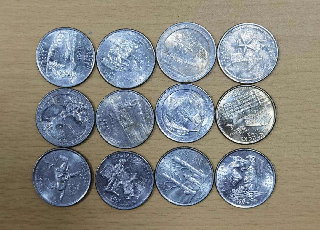 北京马甸外国钱币专卖微拍第三十期，非贵金属纪念币，流通币专场，陆续上新，欢迎关注 美国25美分纪念币12枚，品相如图