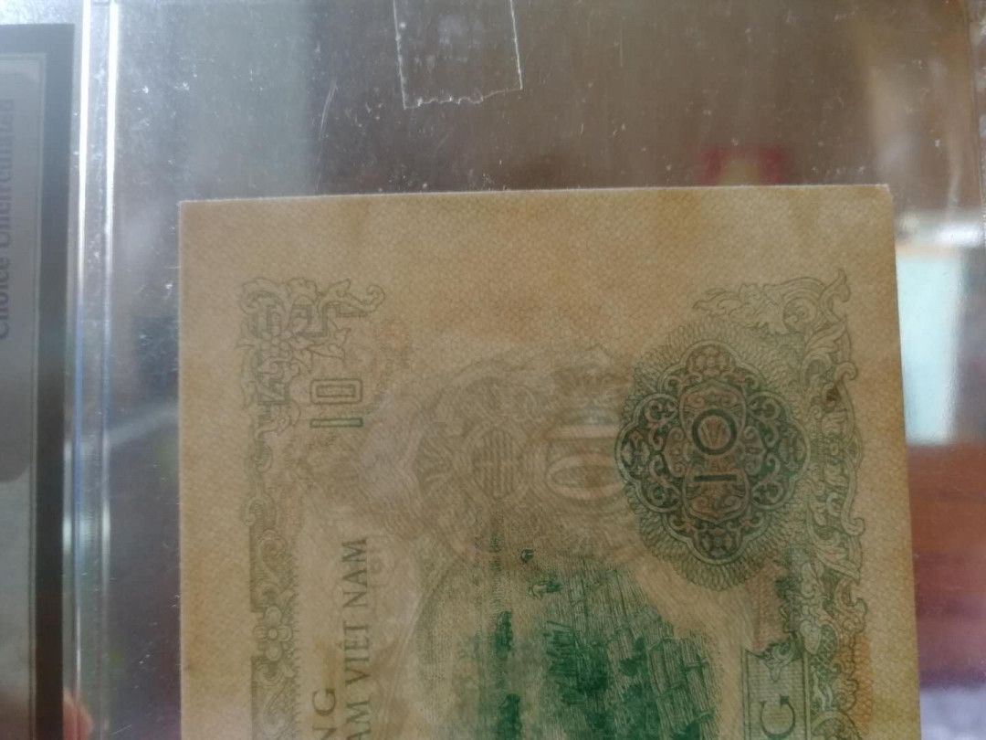 【鲸贝乐淘·外币】千字文·第“高冠陪辇，驱毂振缨”号拍卖 【中国代印】1963年越南10盾，PMG64 ，高分珍品难得