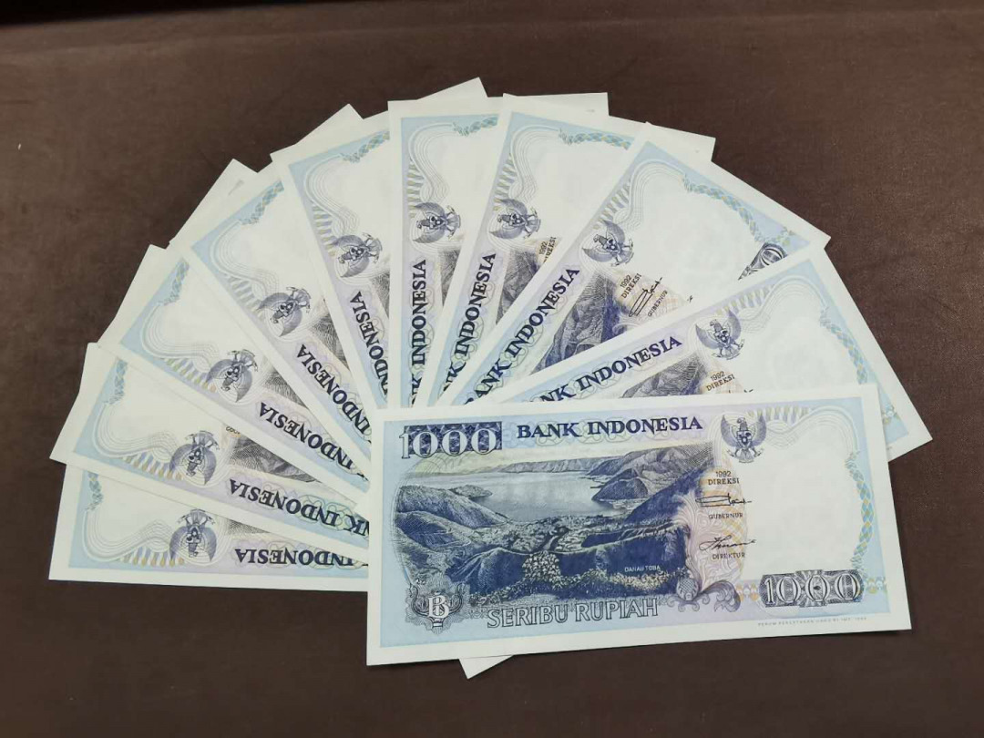 北京马甸外币专卖微拍第三十一期，纸币专场，陆续上新，欢迎光临 印尼早期1000盾纸币10张，品相如图全新