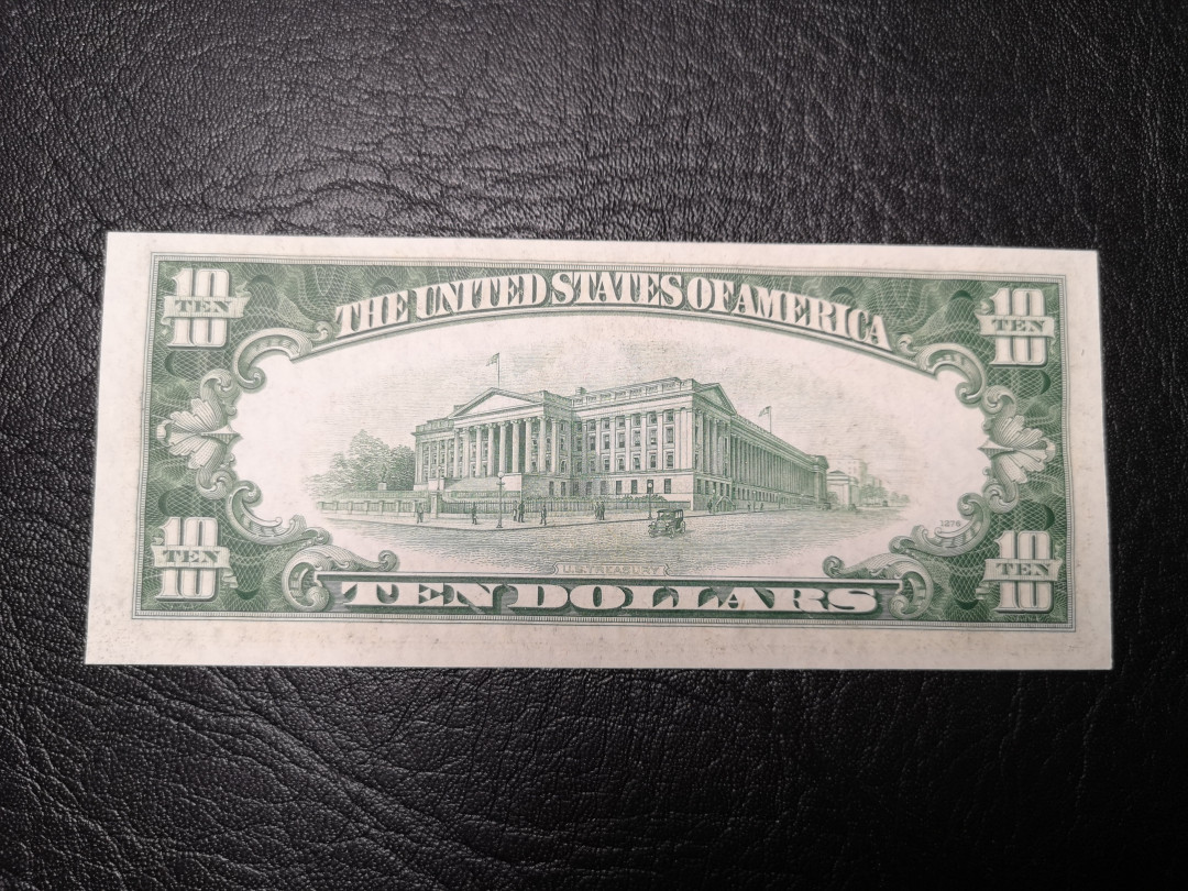 《外钞收藏家》第九十二期 精品拍卖 1934年小头版10美元  全新unc