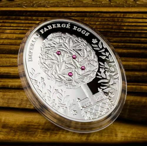 【币观天下】第130场钱币拍卖～ 【纽埃】纽埃2012年2元，56.56克 皇家费伯奇彩蛋系列---“香味甜月桂”，镶嵌紫色施华洛世奇宝石(4颗) 异形(椭圆形) 精制纪念银币