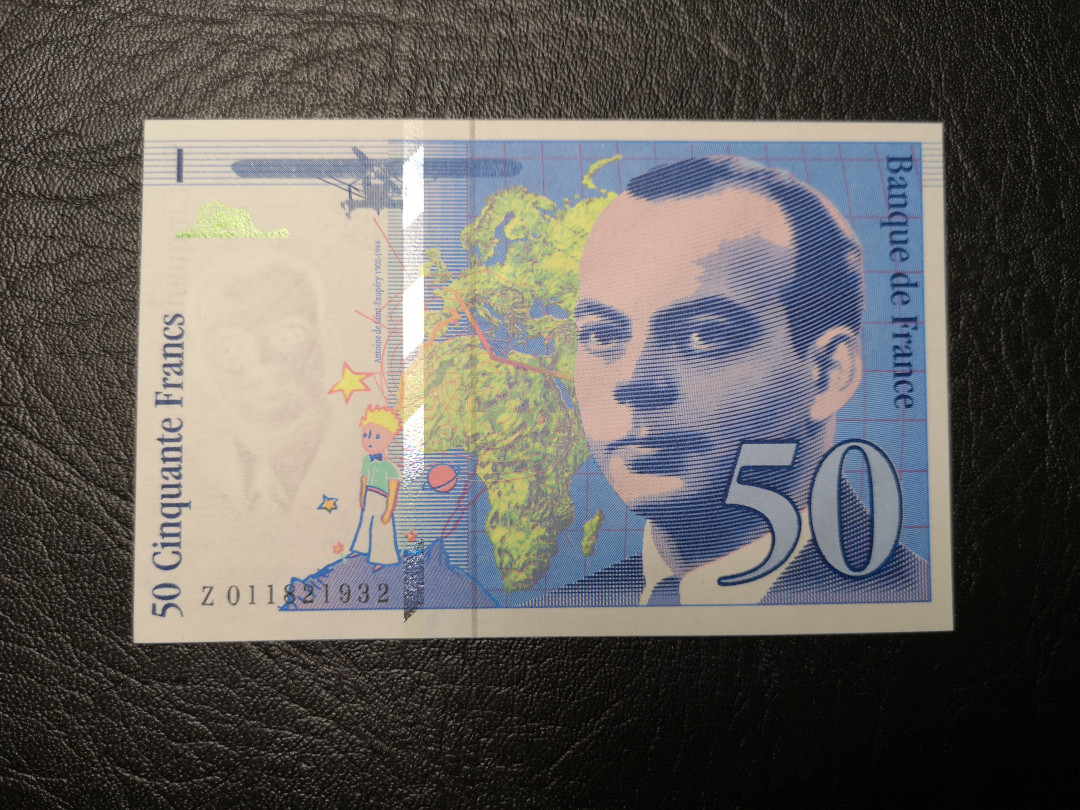 《外钞收藏家》第九十二期 精品拍卖 法国末版 50法郎 有平光下有不明显中折  测光可以看到