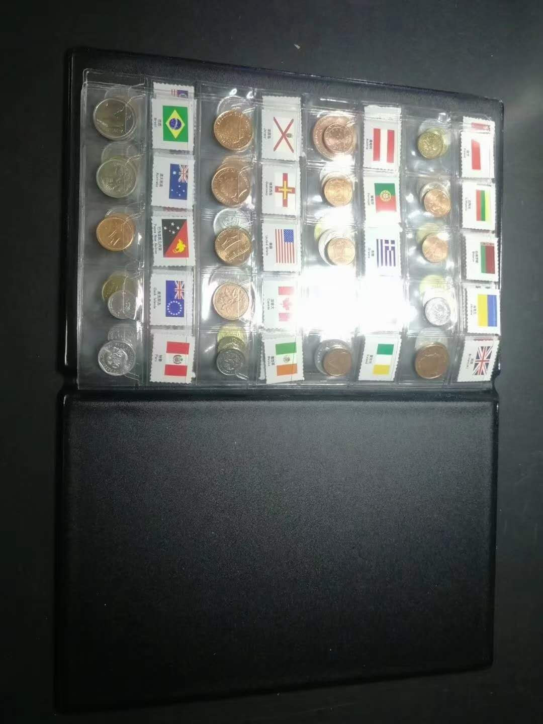 闽南收藏拍卖第1期 外币全不同60枚一起带册带国旗