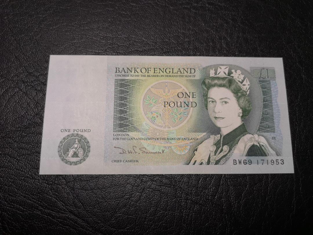 《外钞收藏家》第九十三期拍卖 英国D序列1镑  全新UNC