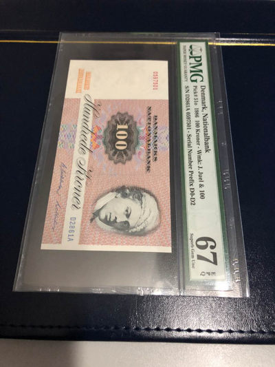 【囧羊收藏】精选微拍第9期 世界钱币精选 - 1986年丹麦100克朗 初版无金属线 PMG67E高分