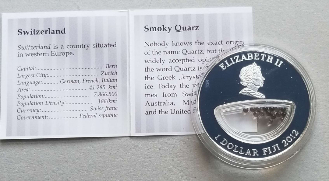 【币观天下】第133场拍卖【圣诞场】 斐济2012年自然母亲宝藏系列瑞士紫水晶镂空镶嵌银币 